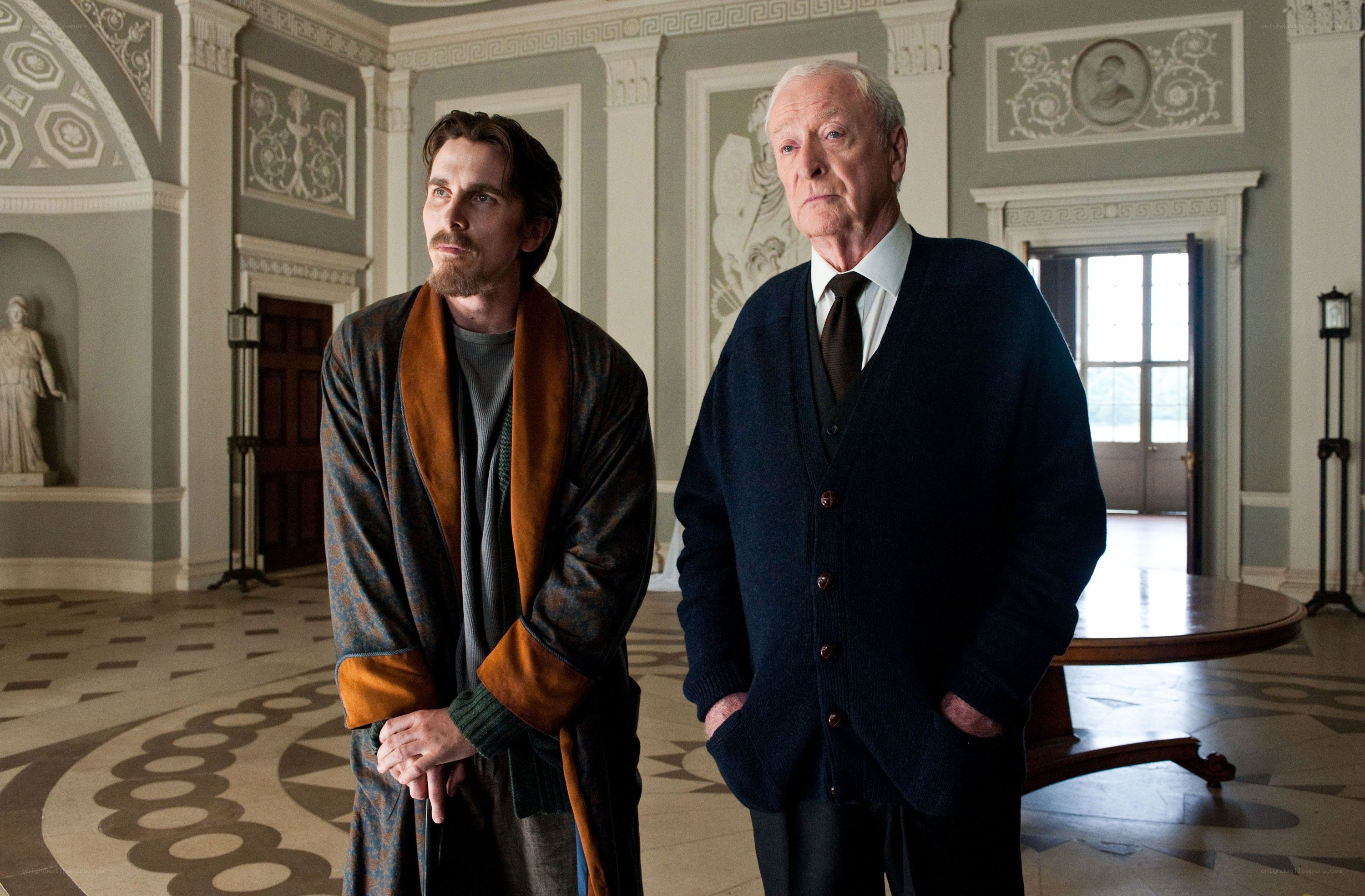 Two men in a grand hall