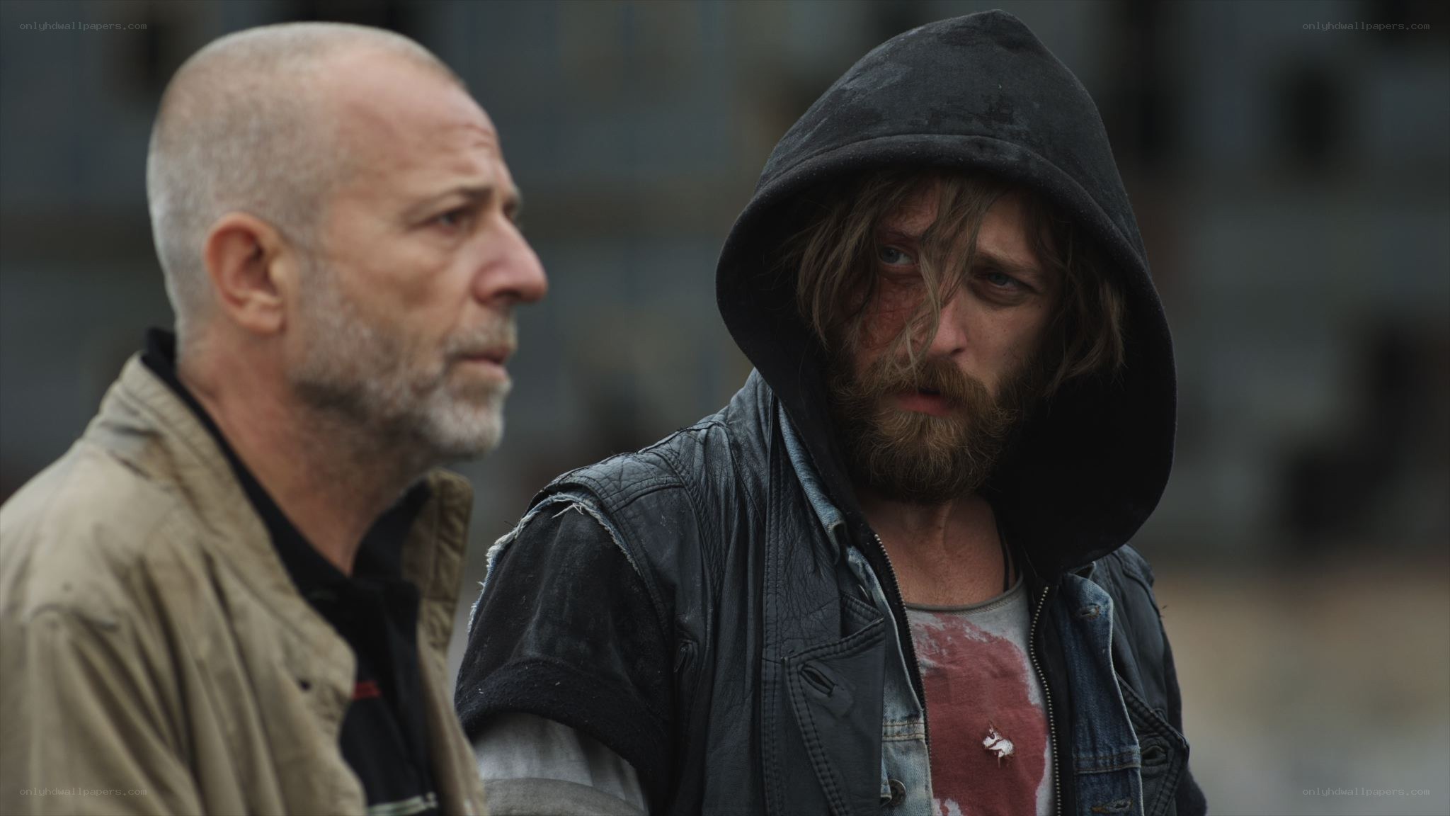 two men in a gritty scene