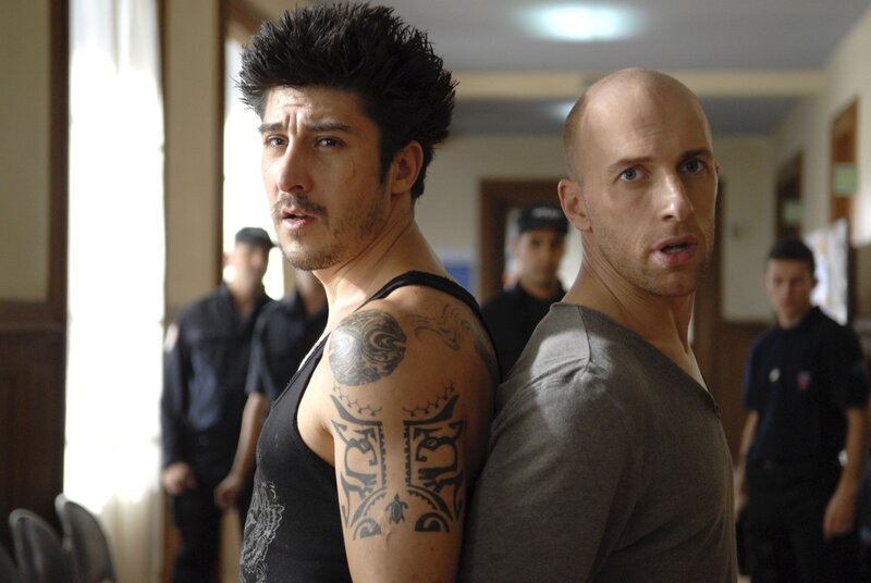 Two Men in a Hallway — Black, Dramatic, Afternoon