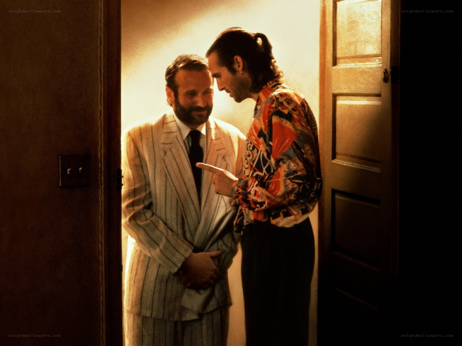 two men in a hallway
