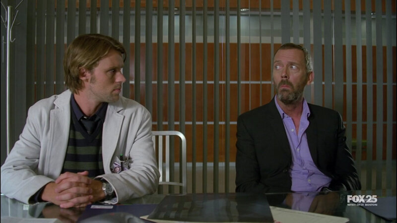 two men in a meeting