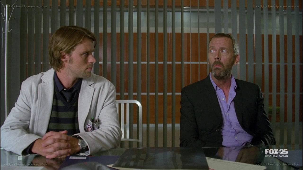 two men in a meeting