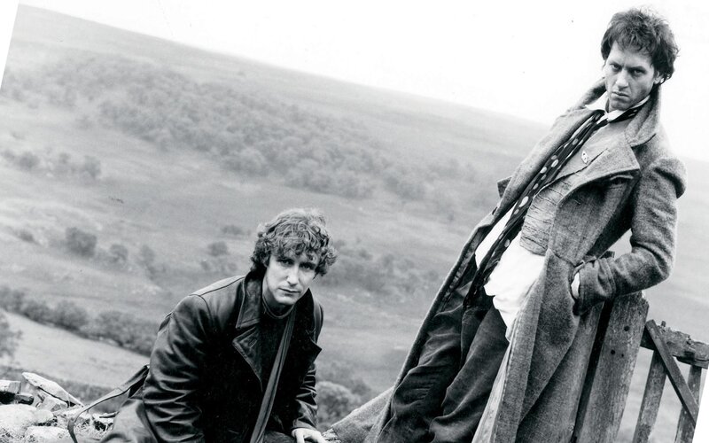 Two men in a rural landscape