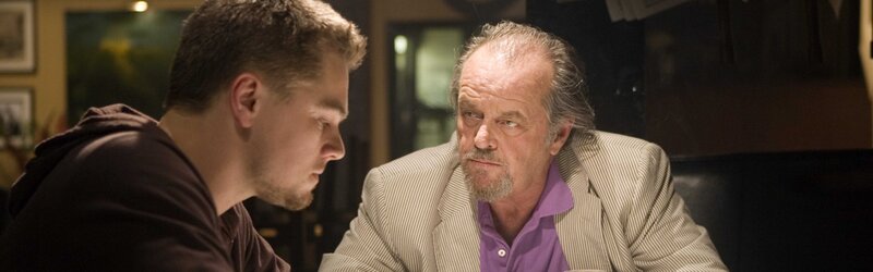 Two men in a serious conversation