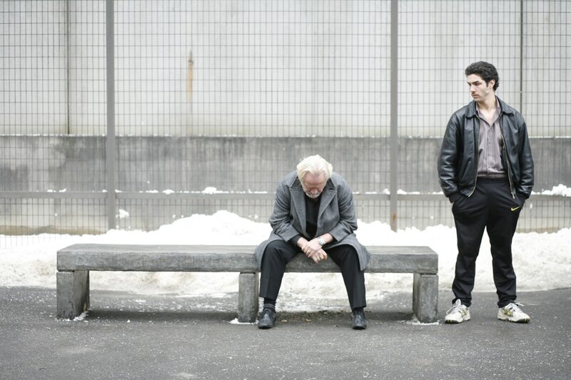 Two men in a snowy scene