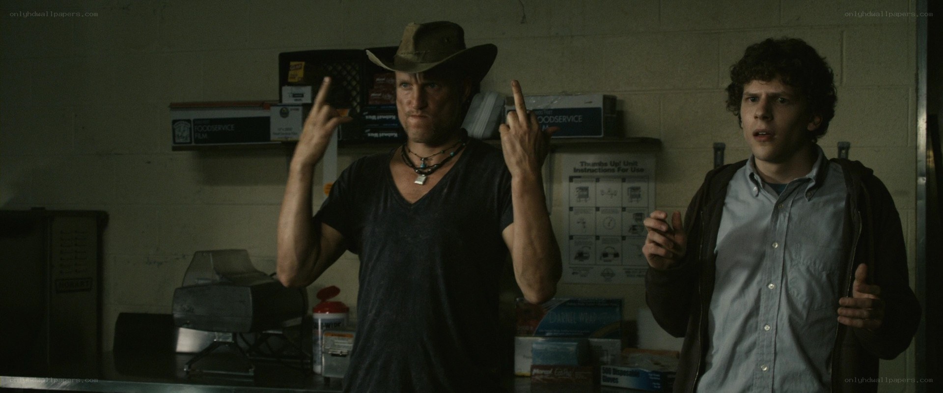 Two men in a storage room