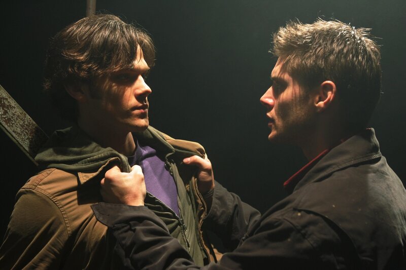 two men in a tense confrontation