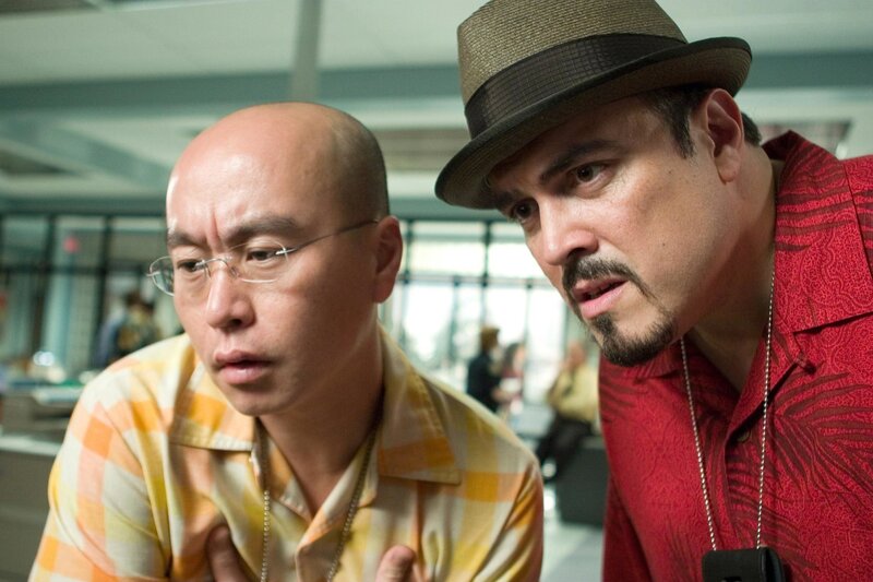Two men in a tense conversation