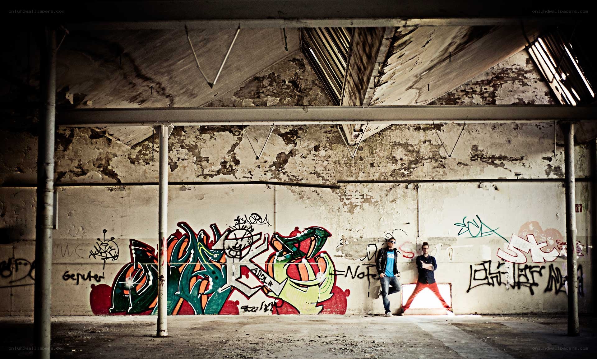 Two men in an abandoned building