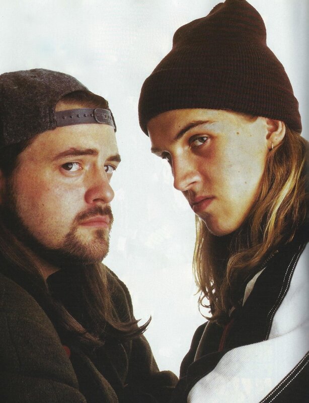 two men in beanies looking at camera