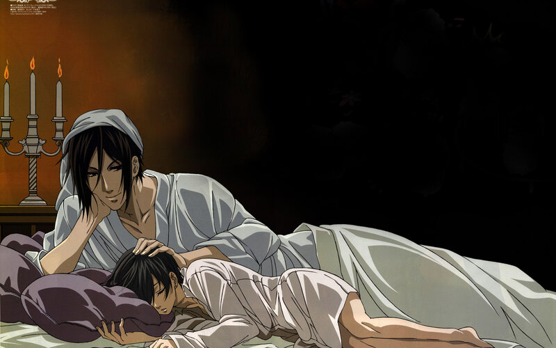Two men in bed together