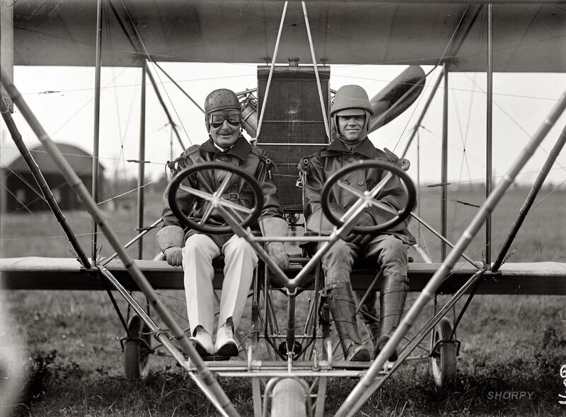 Two Men in Biplane