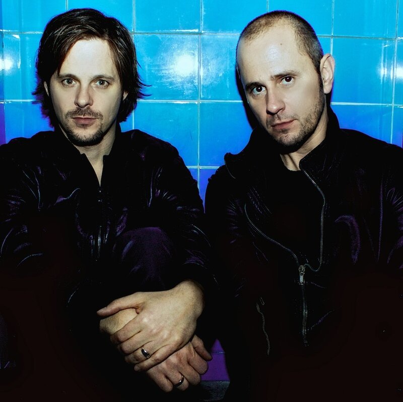 Two Men in Black Jackets — Blue