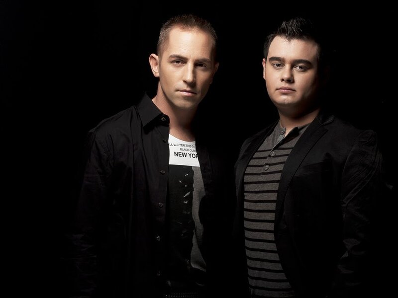 two men in black shirts