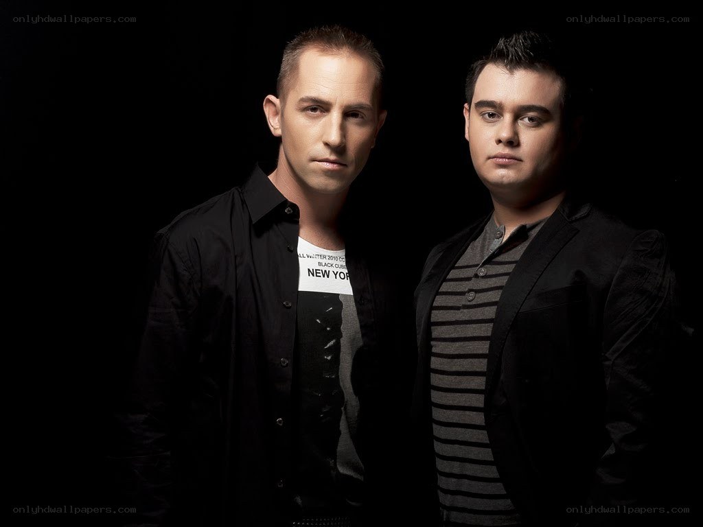 two men in black shirts