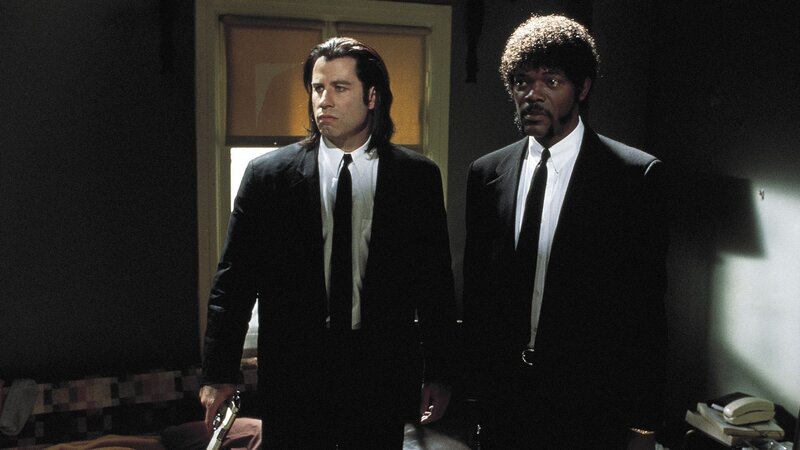 two men in black suits