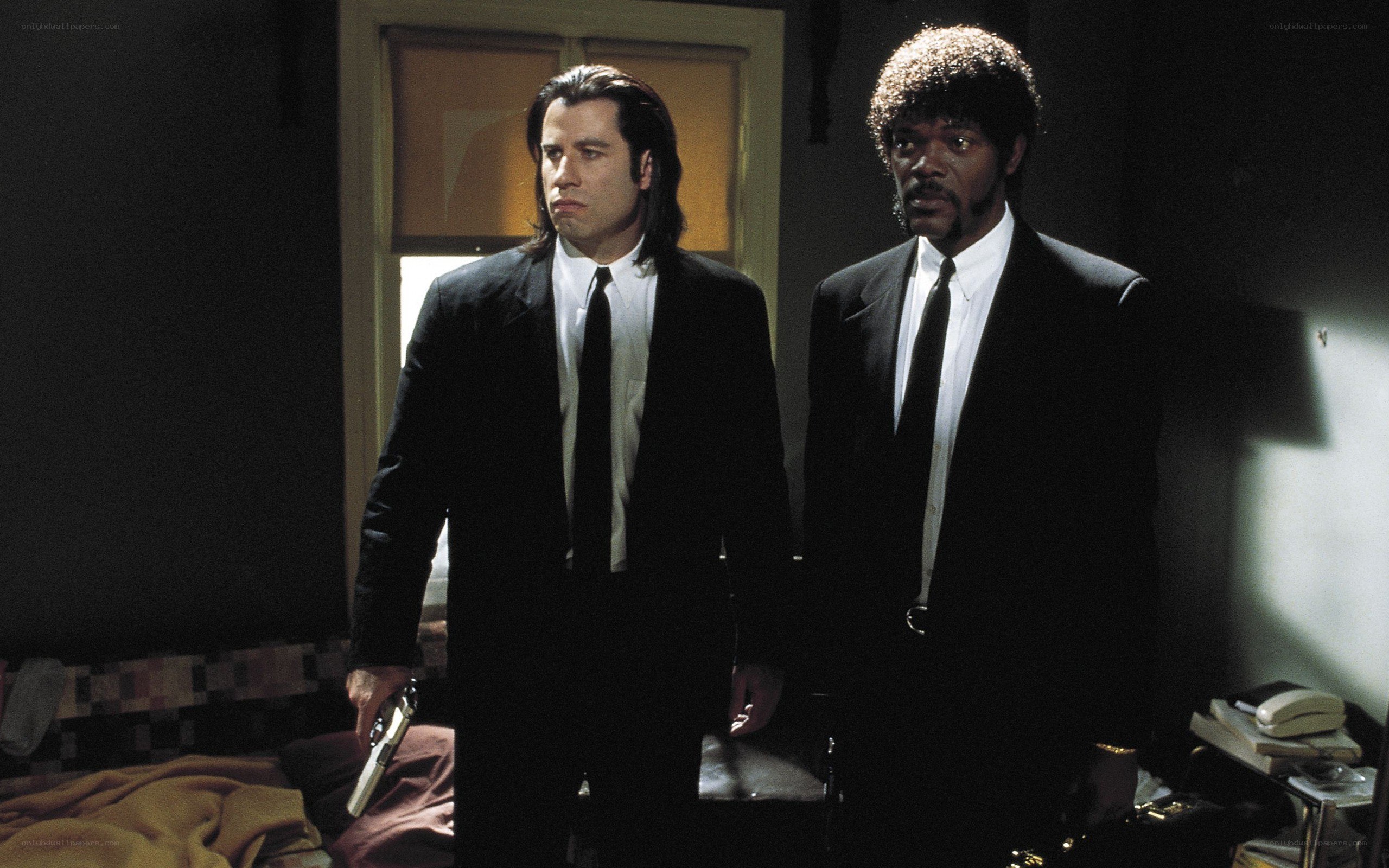 two men in black suits