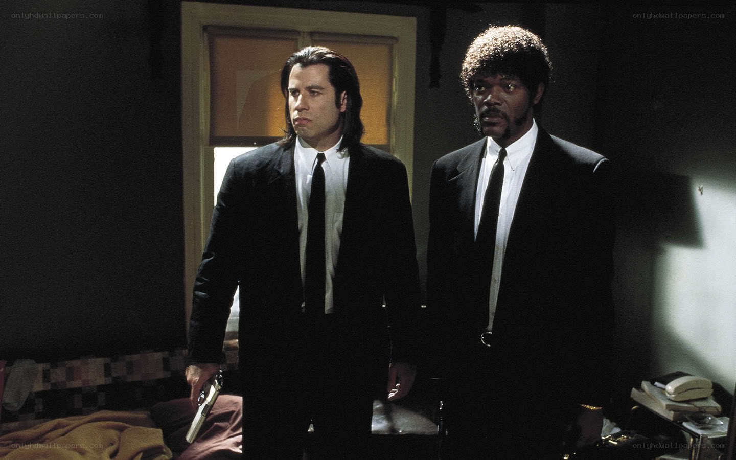 two men in black suits