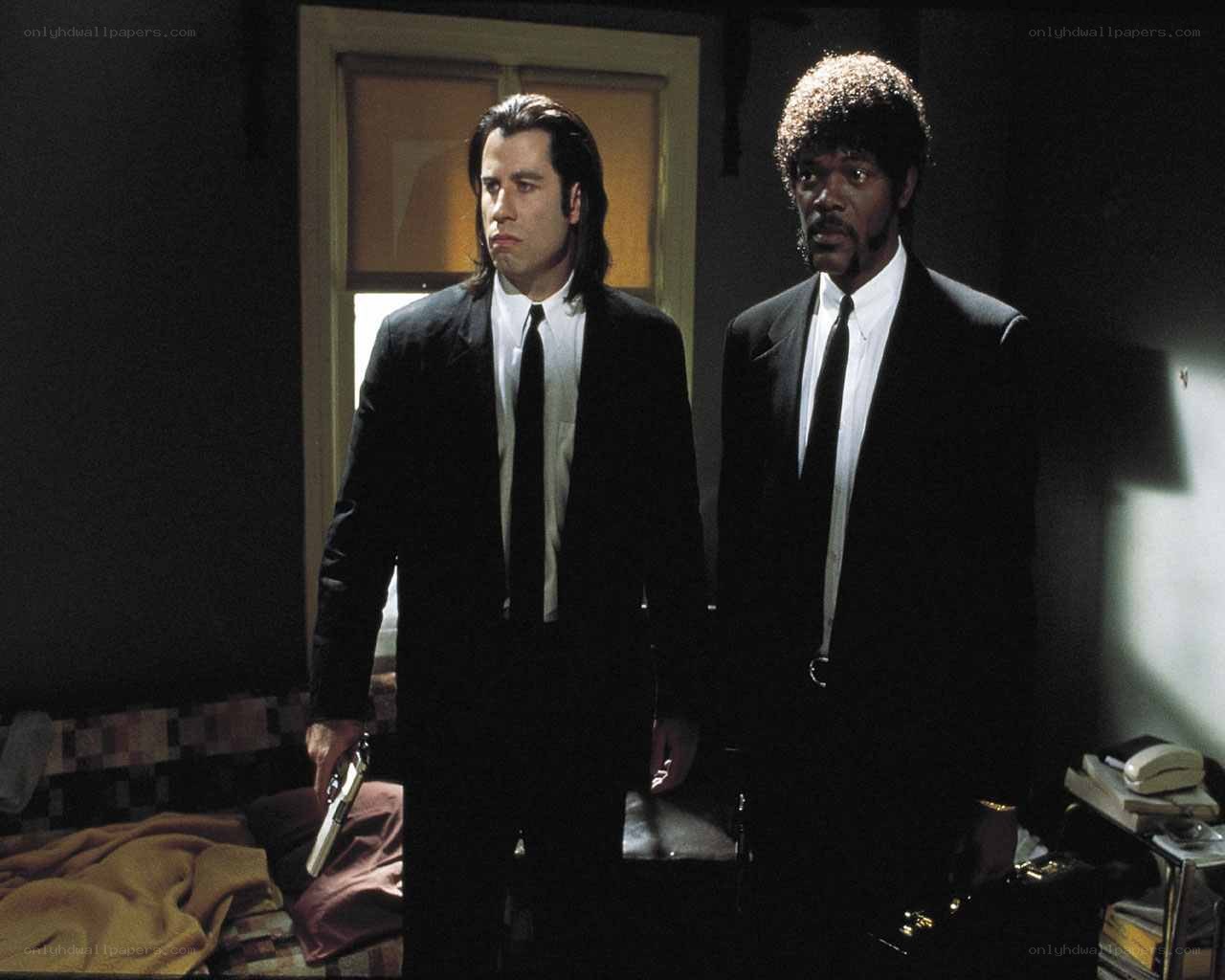 two men in black suits