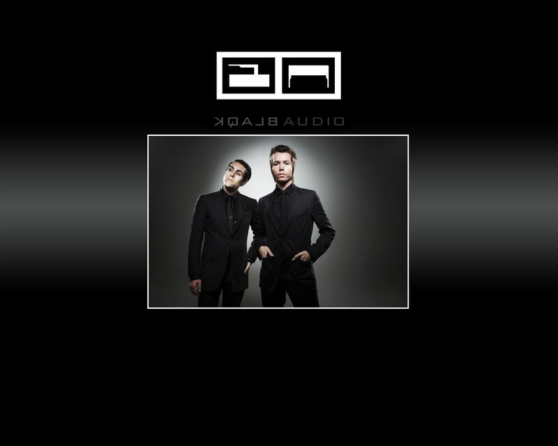 Two Men in Black Suits — Dramatic, Photograph, Logo