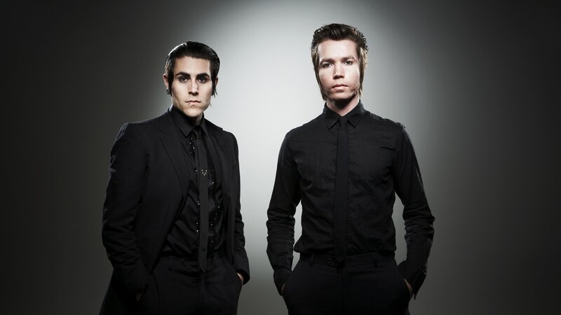 two men in black suits