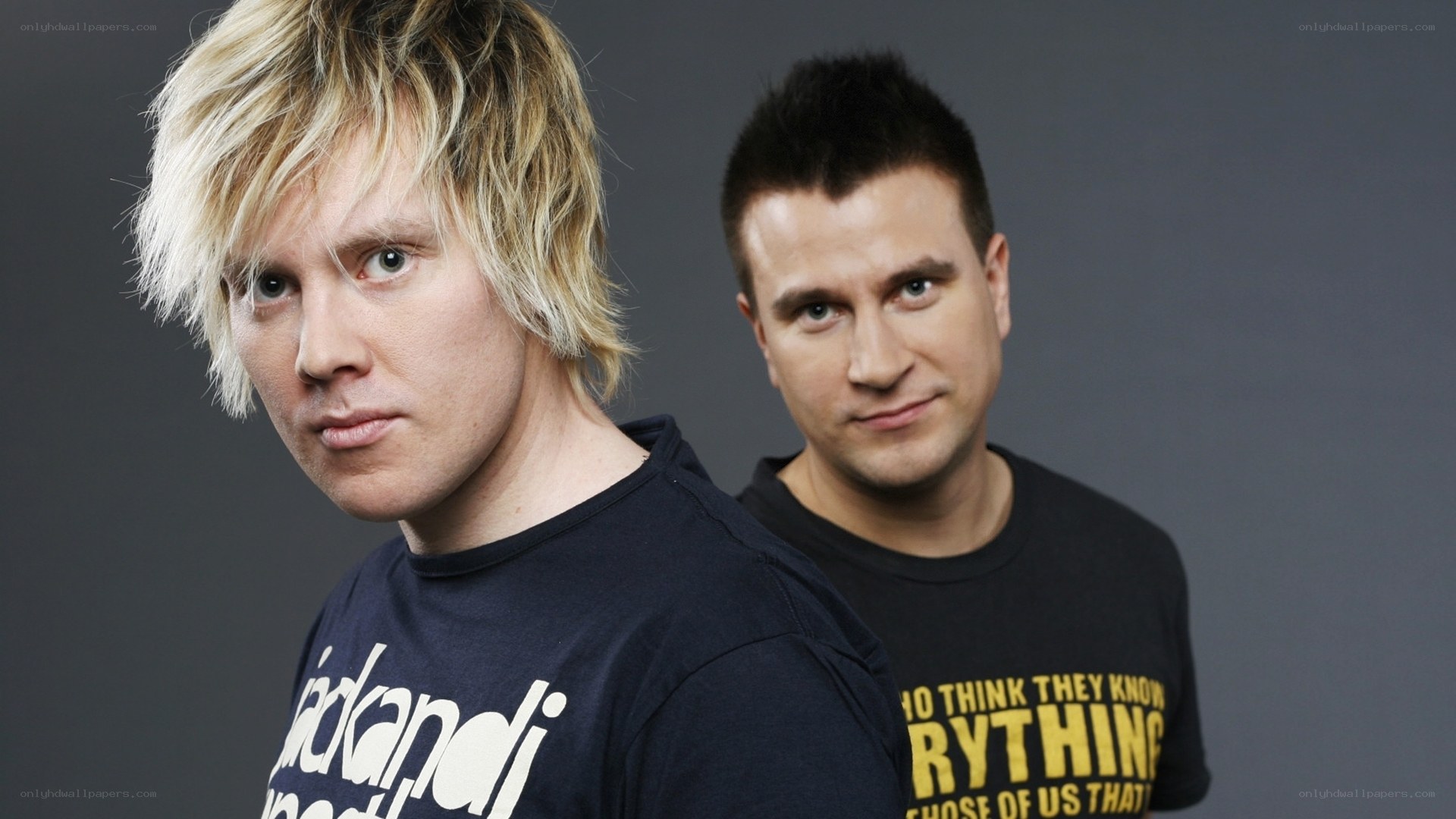 two men in black t-shirts