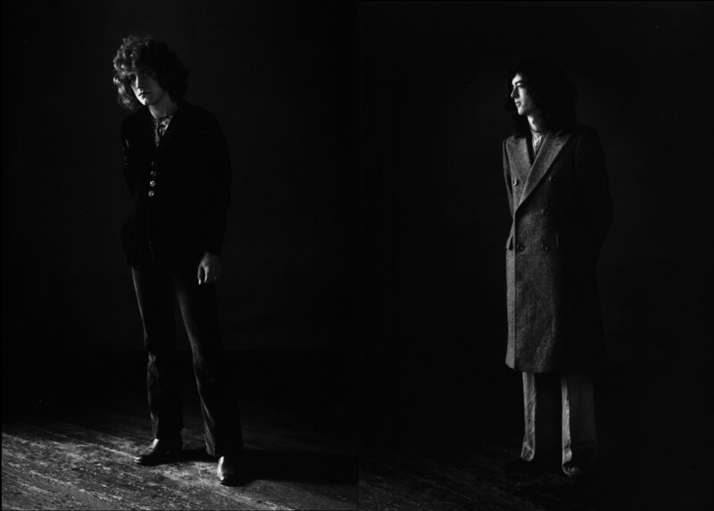 Two Men in Coats — Black, Dramatic