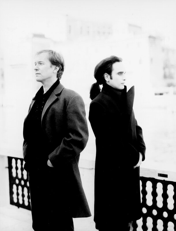 two men in coats standing