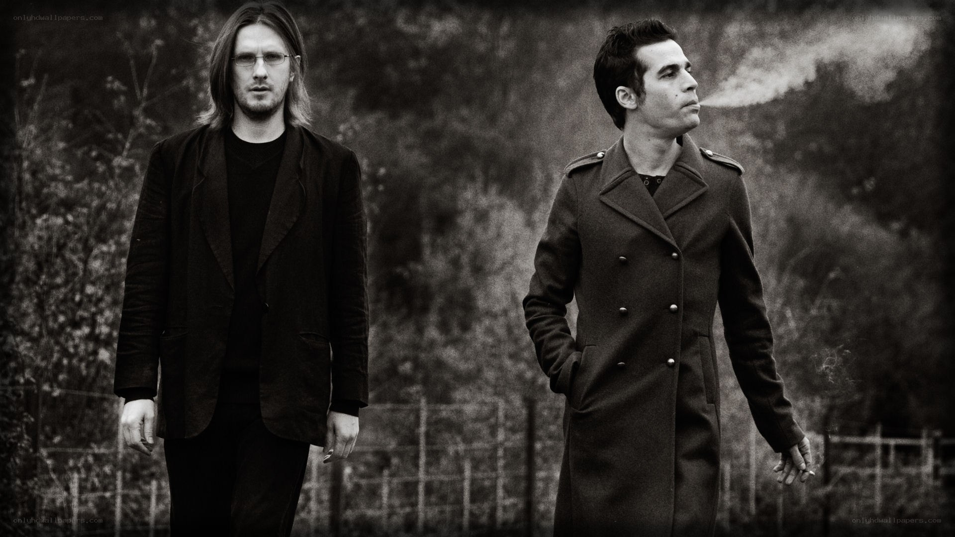two men in coats walking