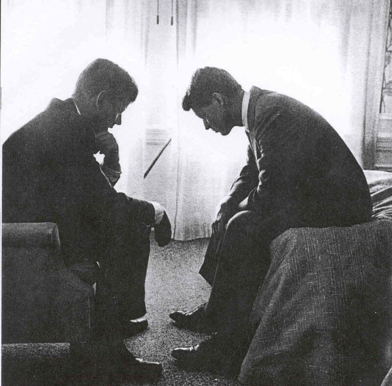 two men in conversation