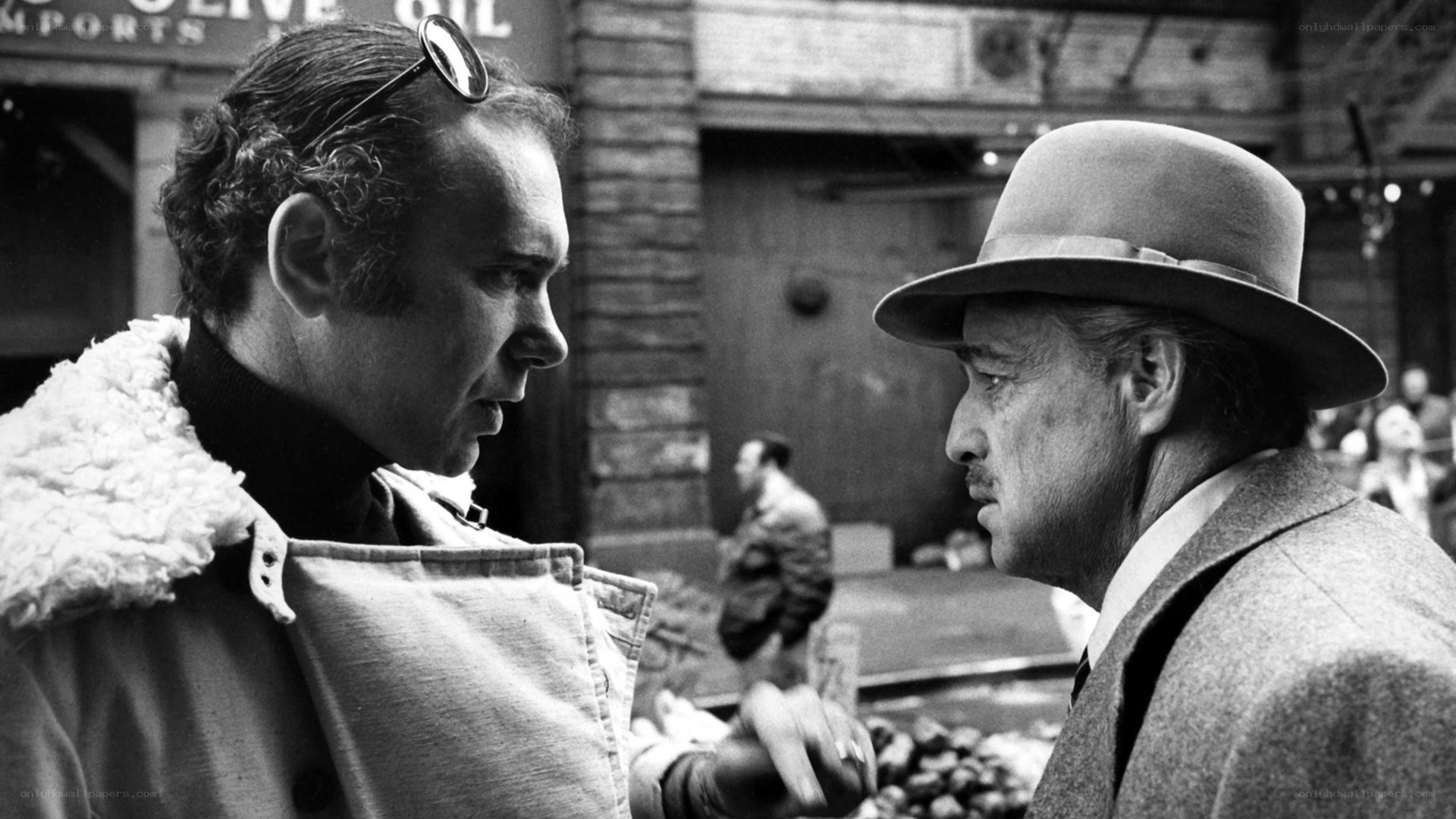 Two men in conversation on a street