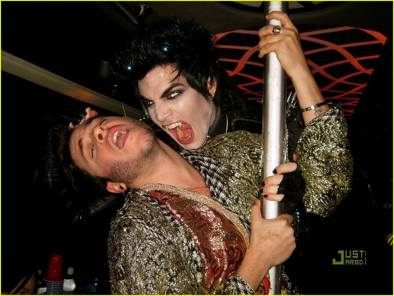 Two Men in Costumes — Black