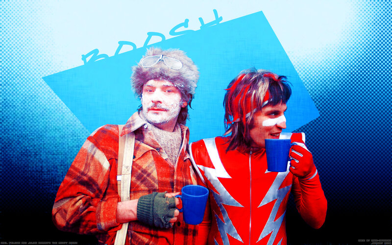 Two men in costumes with mugs