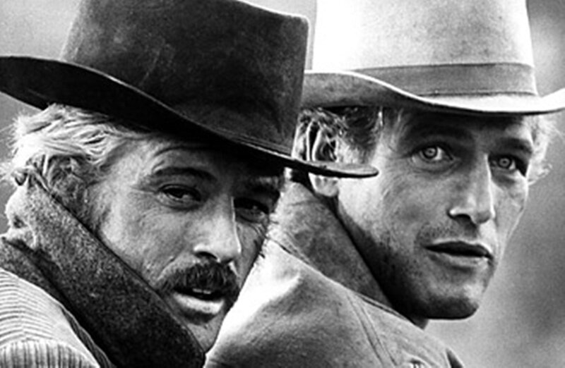 Two Men in Cowboy Hats — Black, Serious