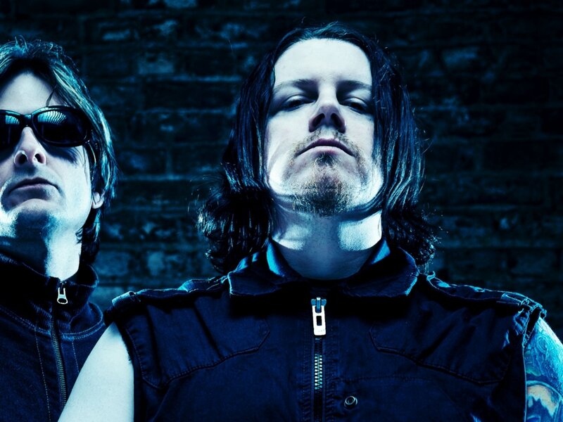 Two Men in Dark Clothing — Blue