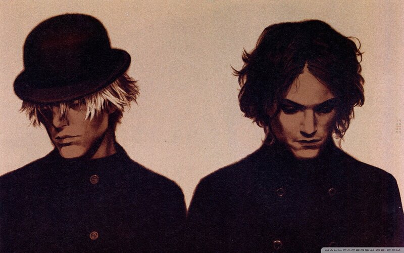 Two Men in Dark Coats — Black