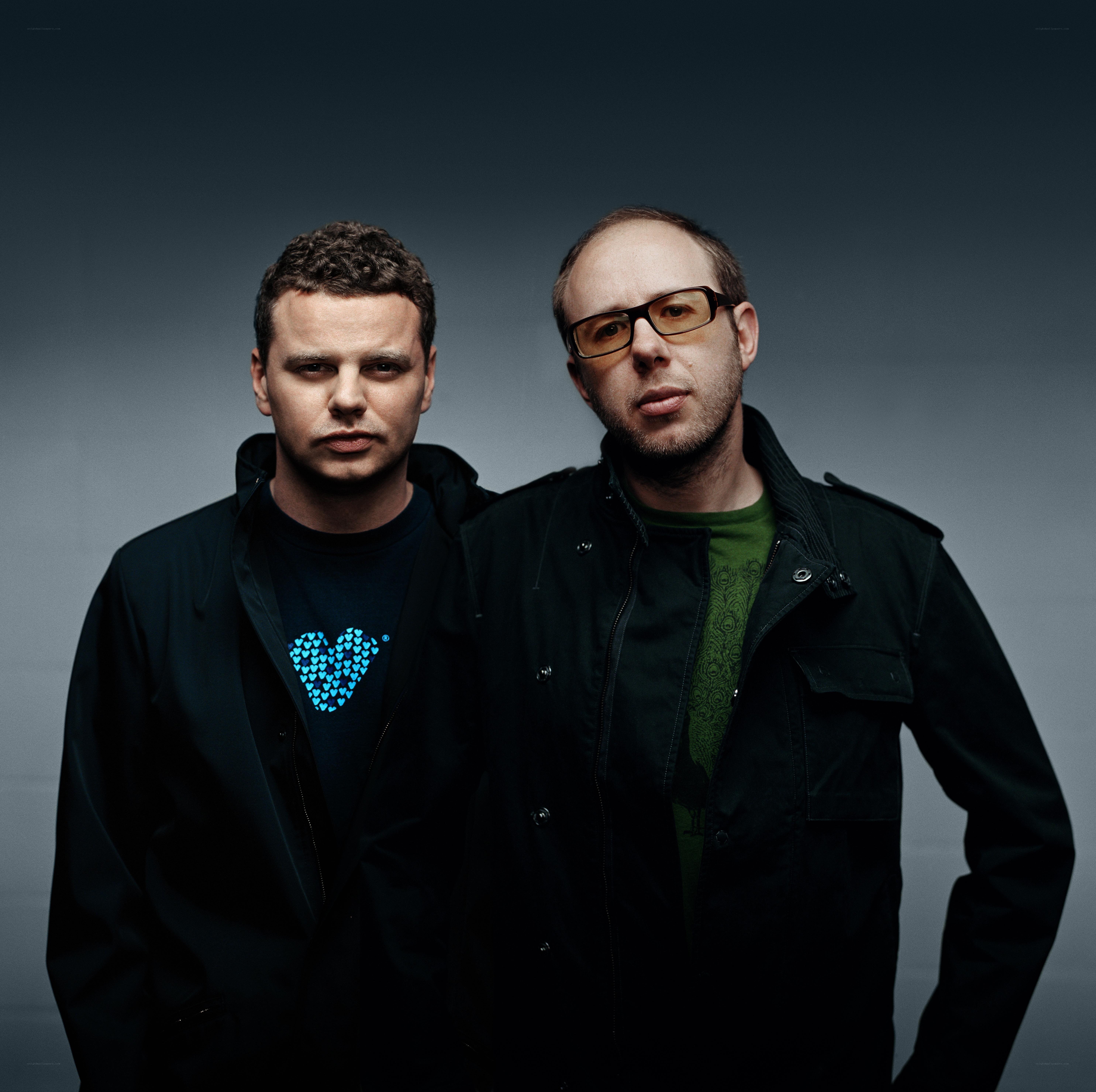 two men in dark jackets