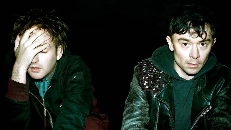 Two Men in Dark Jackets — Black
