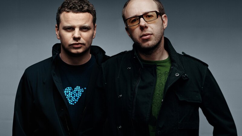 two men in dark jackets