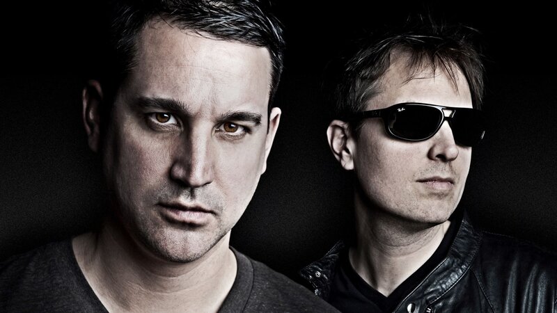 two men in dark setting