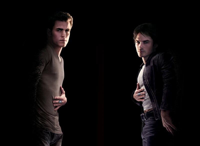 two men in dark setting