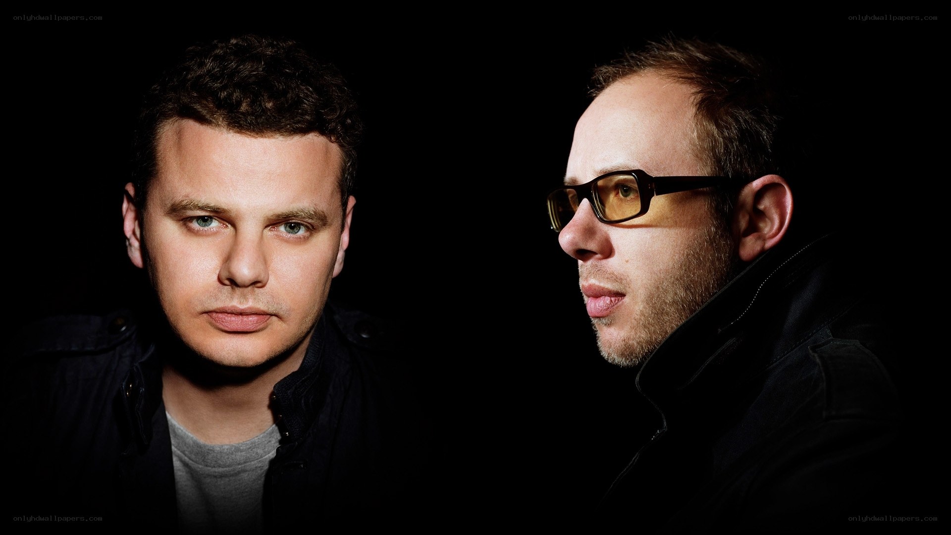 two men in dark setting