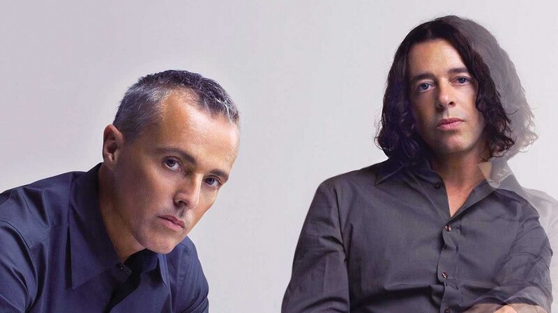 two men in dark shirts