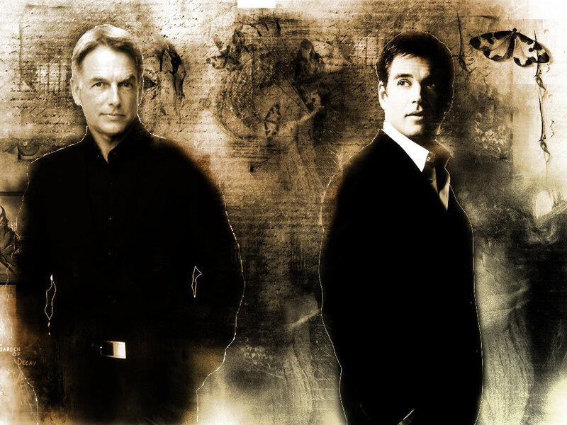 two men in dark suits