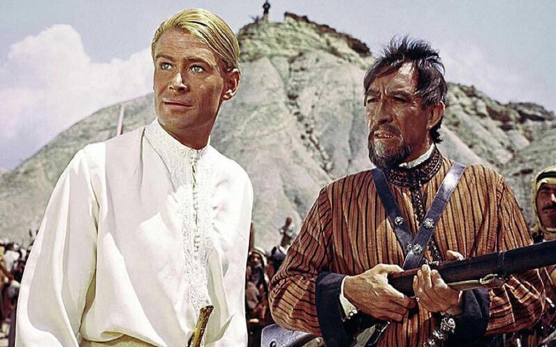 Two Men in Desert Attire — White, Dramatic
