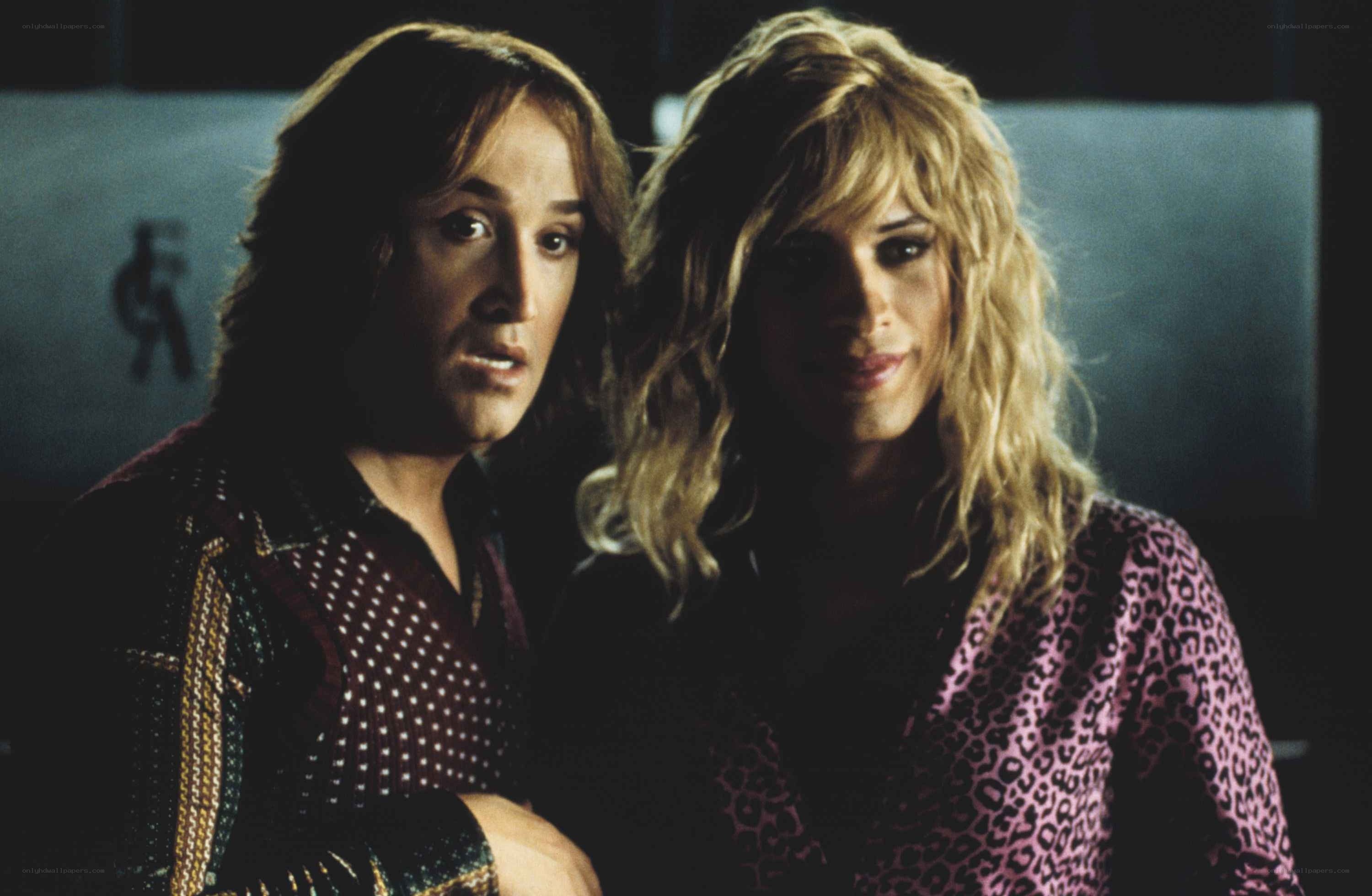 Two men in drag costumes