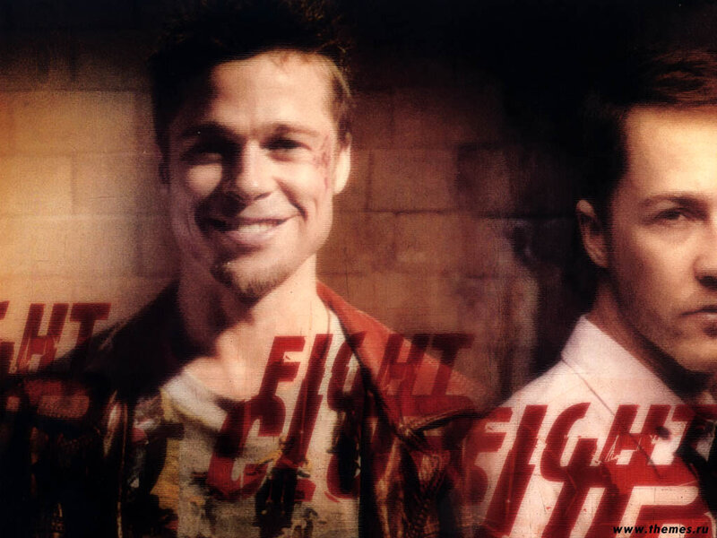 Two Men in Front of Brick Wall
