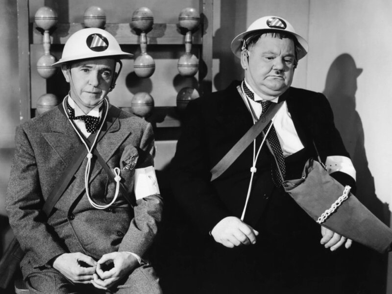 Two men in hard hats