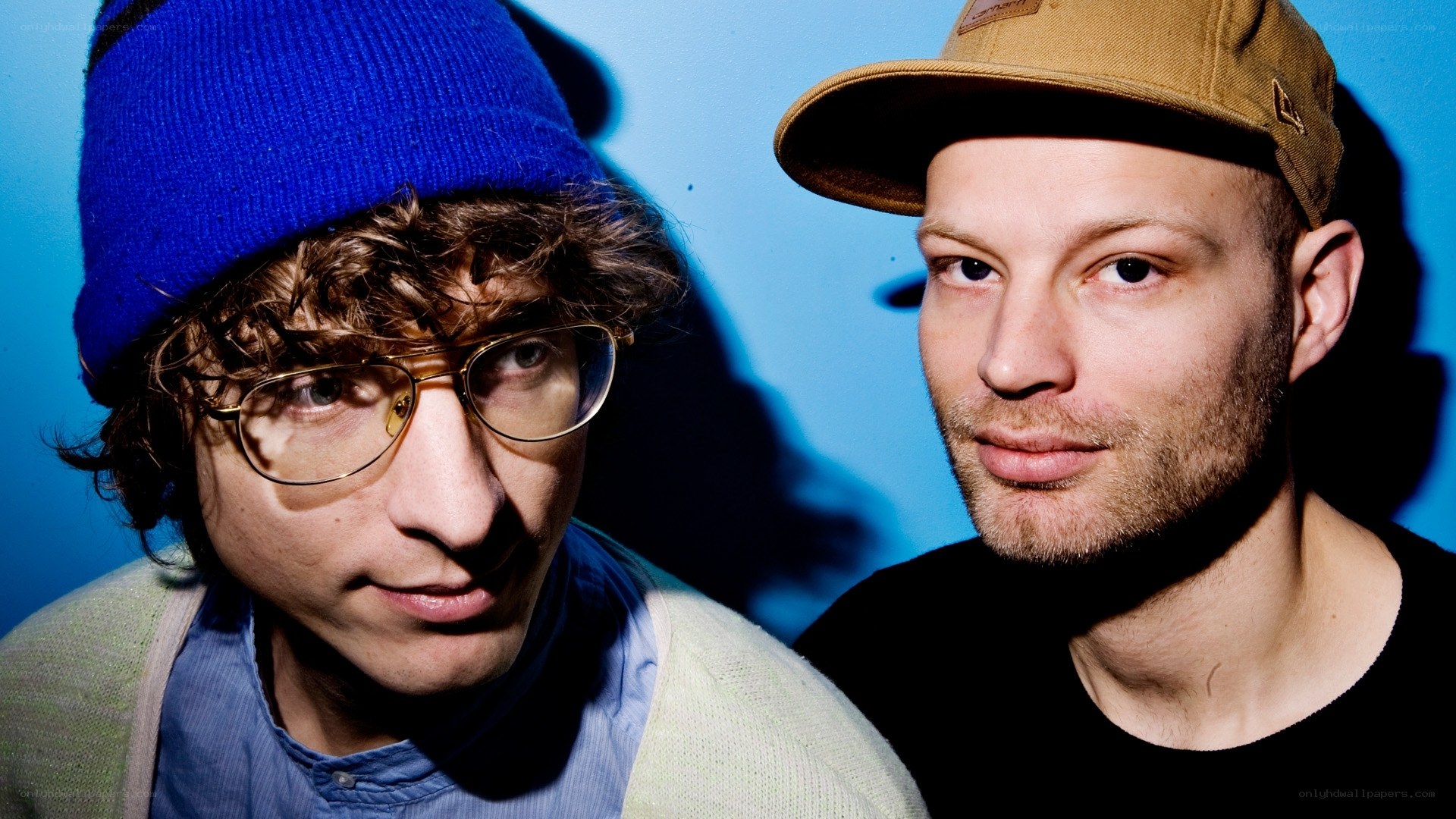 two men in hats and glasses