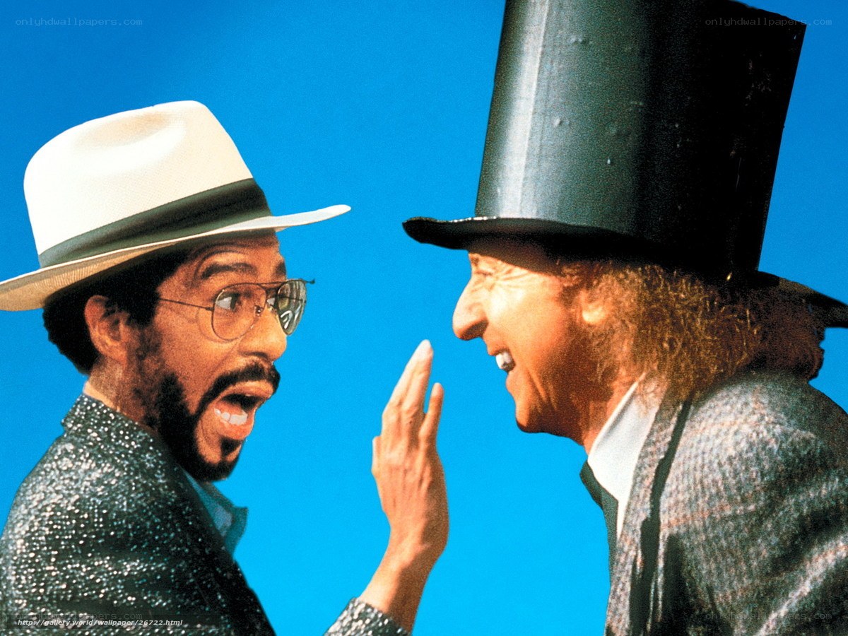Two men in hats facing each other